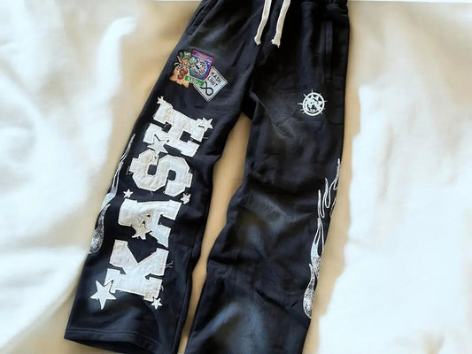 Tytuł produktu: KASH Star Applique Double-Waist Oversized Sweatpants – Szerokie Spodnie Dresowe (Czarne / Różowe)